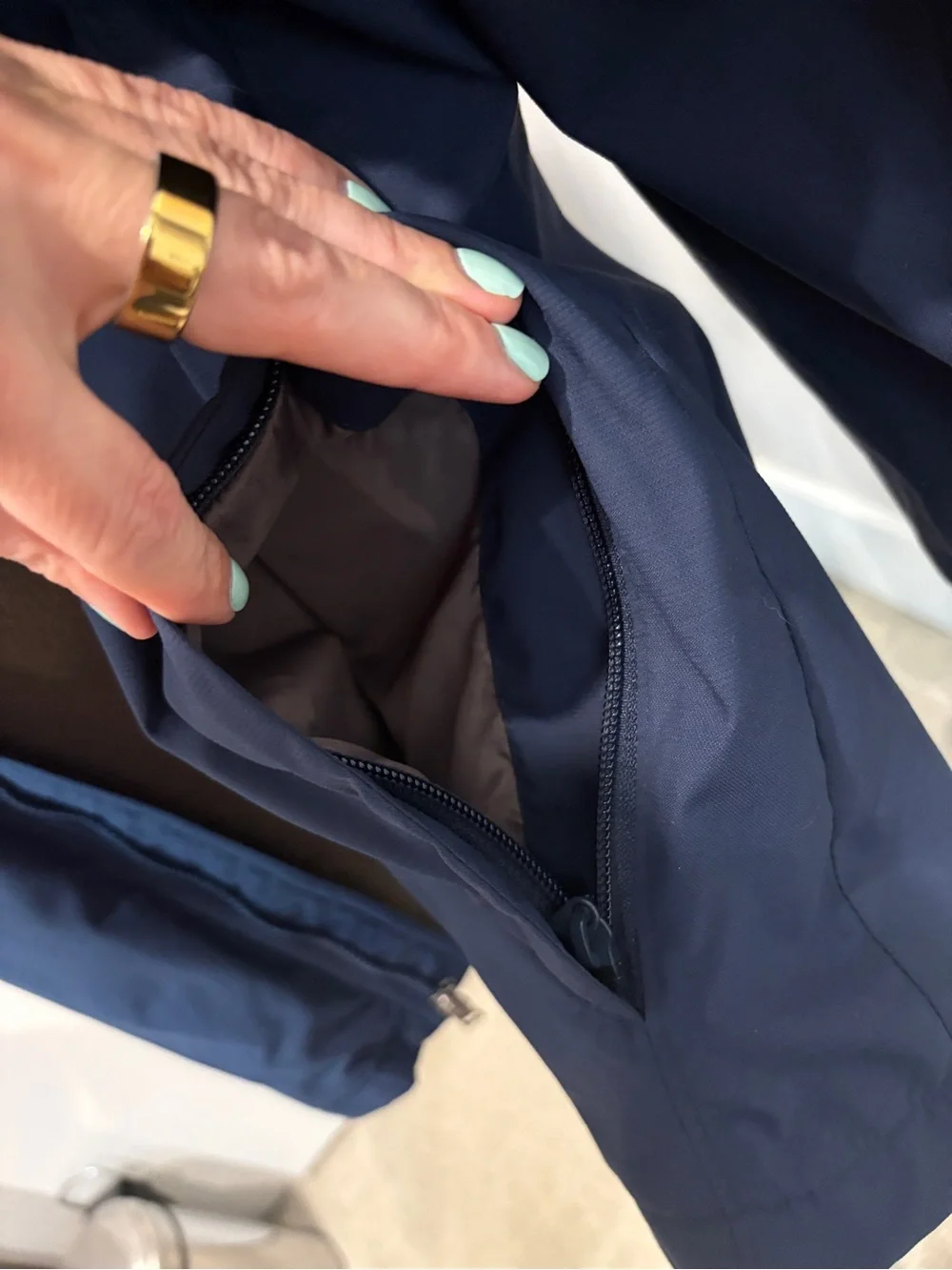 Columbia Men's Navy Jacket with Tan Fleece Lining and zip pockets - large